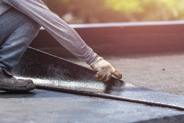 Professional Waterproofing technician working in Bushwood, MD